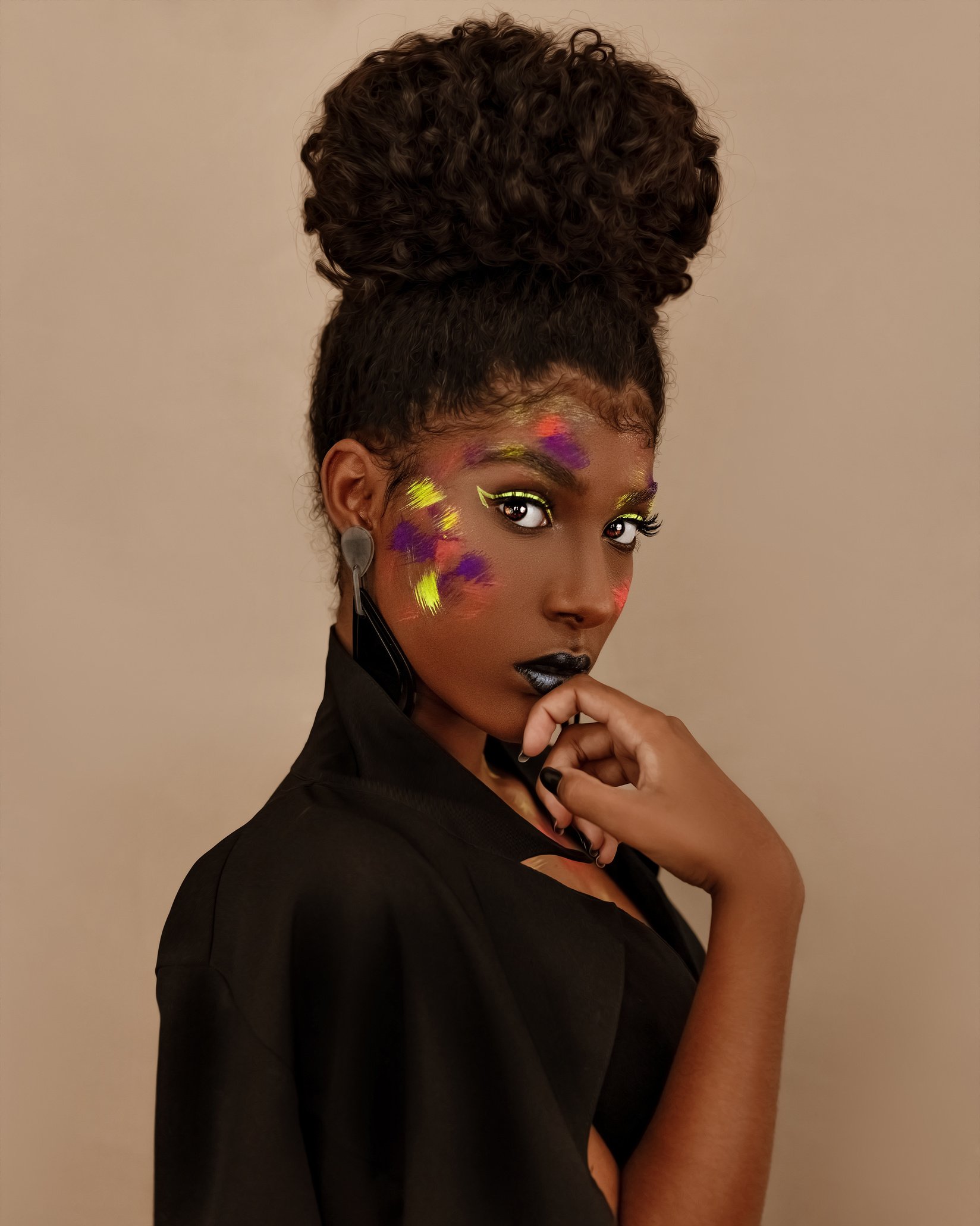 Black woman with painted colorful face